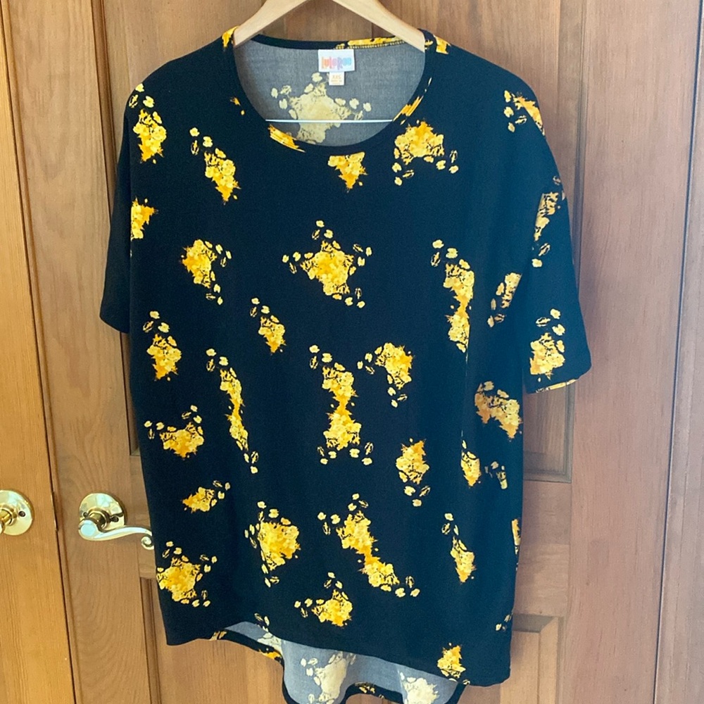 Like new XXS black and gold LulaRoe Irma.